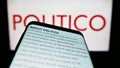 Mobile phone with webpage of US political newspaper company Politico LLC on screen in front of business logo. Royalty Free Stock Photo