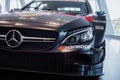 STUTTGART, GERMANY - OCTOBER 16, 2018: Mercedes Museum. Sport car with inscriptions on it. Front view of black auto