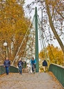 Stuttgart, Germany - People cross pedestrian bridge on working d