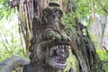 Stutue in Sacred Monkey Forest, Ubud, Bali, Indonesia Royalty Free Stock Photo