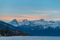 Stuuning view of Eiger North Face Monch and Jungfrau in sunset from lake side of Thun