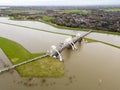 An open weir due to high water level in the Nederrijn river, Holland