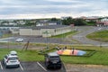 Children, teens and adults enjoy bouncing on a jumping balloon trampoline in a park in