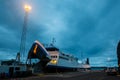 StykkishÃÂ³lmur in night, evening, beautiful town in Iceland, harbor, port in night with lights and fishing ships. Royalty Free Stock Photo