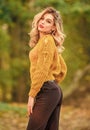 Style is all about balance. Woman wear warm sweater nature background defocused. Gorgeous lady feeling cozy in woolen