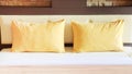 Style bedroom interior with double yellow pillows Royalty Free Stock Photo