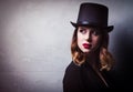 Style and mystique redhead girl in top hat Royalty Free Stock Photo