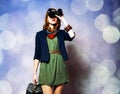 Style redhead girl with binocular and suitcase Royalty Free Stock Photo