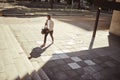 Style, travel and a fashion young man walking in a empty city or urban town. Corporate african american man or business Royalty Free Stock Photo