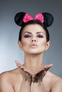 Style woman portrait perfect face, professional make. fashion mouse with big ears.