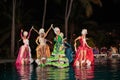 Styled dance performed at night water pool by Cuban beautiful girls, wearing vintage amazing costumes