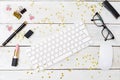 Styled feminine desktop with sparkles and lipstick. Flatlay Royalty Free Stock Photo