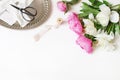 Styled stock photo. Feminine wedding or birthday table composition with floral bouquet. White and pink peonies flowers Royalty Free Stock Photo