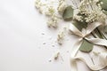 Styled stock photo. Feminine wedding desktop mockup with baby\'s breath Gypsophila flowers, dry green eucalyptus leaves Royalty Free Stock Photo