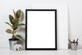 Styled tabletop, empty frame, painting art poster interior mock- Royalty Free Stock Photo