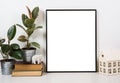 Styled tabletop, empty frame, painting art poster interior mock- Royalty Free Stock Photo