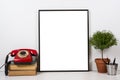 Styled tabletop, empty frame, painting art poster interior mock- Royalty Free Stock Photo