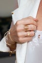 Styled woman hands with silver gold jewelry Royalty Free Stock Photo