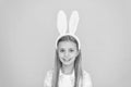 Styling in her Sundays best. Cute little girl wearing bunny ears headband. Small girl child in easter bunny style