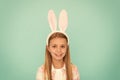 Styling in her Sundays best. Cute little girl wearing bunny ears headband. Small girl child in easter bunny style