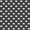 Stylish abstract seamless pattern with black graphic hearts.