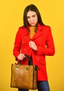 Stylish accessories. Beauty brunette. Fashionable woman in jacket. Fashion autumn winter. female trendy beauty. handbag Royalty Free Stock Photo