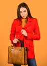 Stylish accessories. Beauty brunette. Fashionable woman in jacket. Fashion autumn winter. female trendy beauty. handbag Royalty Free Stock Photo