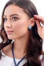 Stylish accessory on woman. Earring on model, necklace on neck. Royalty Free Stock Photo