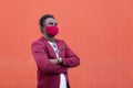 Stylish african man with mask to match his suit Royalty Free Stock Photo