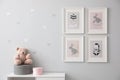 Baby room interior with cute pictures on wall Royalty Free Stock Photo