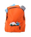 Stylish backpack with school stationery on white background Royalty Free Stock Photo