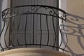 Stylish balcony with a metal forged railing