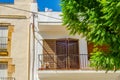 Stylish balcony with a metal railing, solid architectural element, a place of rest and relaxation, vintage decor Royalty Free Stock Photo