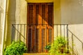 Stylish balcony with a metal railing, solid architectural element, a place of rest and relaxation, vintage decor Royalty Free Stock Photo