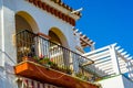 Stylish balcony with a metal railing, solid architectural element, a place of rest and relaxation, vintage decor Royalty Free Stock Photo