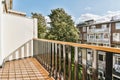 Stylish balcony with metal railings