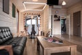 Stylish barbershop interior with hairdresser`s workplace and modern furniture