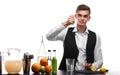 Professional barman preparing a beverage with lime or lemon, isolated on a white background. Restaurant and club concept Royalty Free Stock Photo