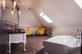 Stylish bathroom in the attic Royalty Free Stock Photo