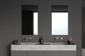 Stylish bathroom interior with sink and two mirrors, window Royalty Free Stock Photo