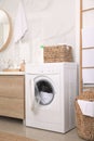 Stylish bathroom interior with washing machine Royalty Free Stock Photo