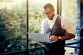 Stylish Bearded Businessman Wearing Glasses White Shirt Waistcoat Working Modern Laptop Holding Hands Near Panoramic Royalty Free Stock Photo