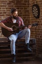 Stylish bearded musician Royalty Free Stock Photo