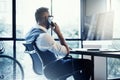 Stylish Bearded Young Man Wearing Glasses White Shirt Waistcoat Working Modern Loft Startup.Creative Guy Using Mobile Royalty Free Stock Photo