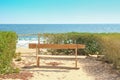 Stylish beautiful bench on nature near the sea background Royalty Free Stock Photo