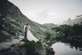 Stylish young wedding couple posing in beautiful Matterhorn moun Royalty Free Stock Photo