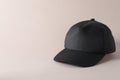 Stylish black baseball cap on light grey background. Mockup for design Royalty Free Stock Photo