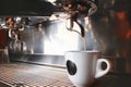 Stylish black espresso making machine brewing two cups of coffee, shooted in cafe. Royalty Free Stock Photo