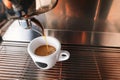 Stylish black espresso making machine brewing two cups of coffee, shooted in cafe. Royalty Free Stock Photo