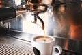 Stylish black espresso making machine brewing two cups of coffee, shooted in cafe. Royalty Free Stock Photo